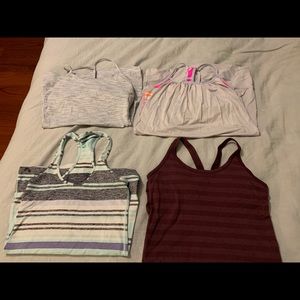 Four lululemon tank tops